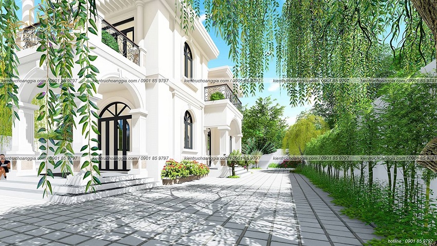 Nhà villa đẹp với cây xanh ở ban công, hàng rào...